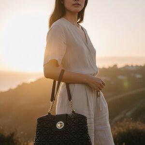 Elegant Black Quilted Kate Spade Handbag